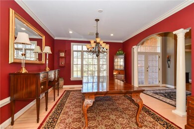 Open dining room with classic accents.