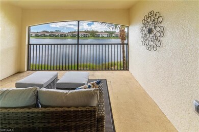 View of patio / terrace with a water view and a balcony