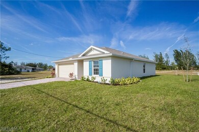 View of home's exterior featuring stucco siding, a