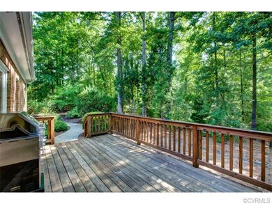 The rear deck has a stamped concrete walk way and 