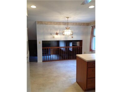 Kitchen. Eat-In Area Looking From Garage Entrance.