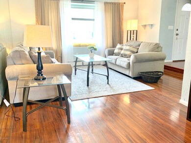 Living room with sunny bay window