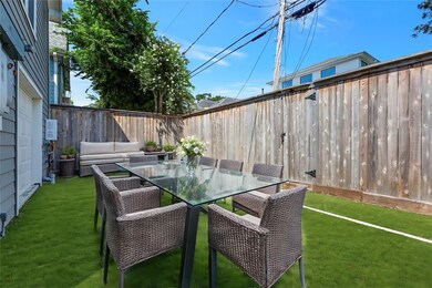 Turf back yard has been virtually staged