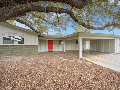 Stiletto posts hold up the carport. The home featu