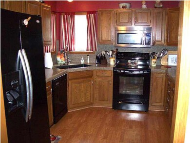 Wood laminate floor, granite counters, updated app