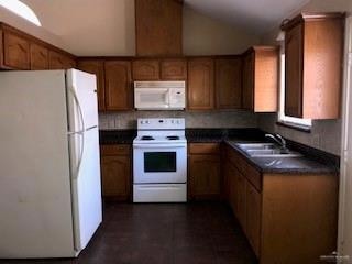 Entrance to property with brick siding