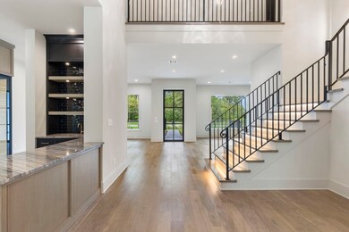 As you walk in from the front door,  you are gree