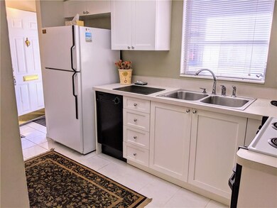 Upgraded cabinets, sink, flooring - very effective