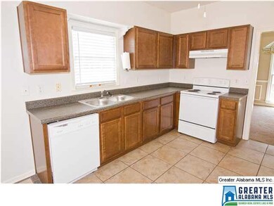 Kitchen is large and recently updated.