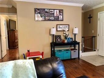 Door to main bedroom is on the left.  Stairs are o
