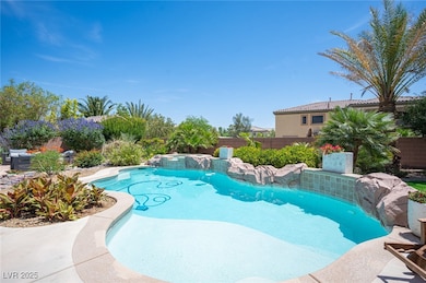 View of pool with a fenced backyard