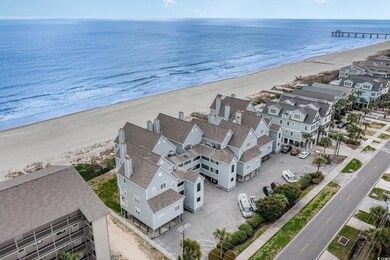 Aerial view with a beach view, a residential view,