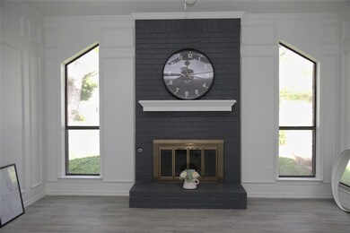 Unfurnished room with dark wood-type flooring