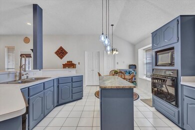 Great size kitchen with pendant lights