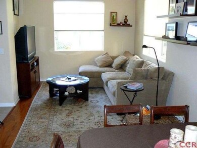 Living room with hardwood flooring