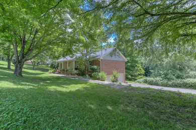 Acre +_ sized lot with a side entry basement garage