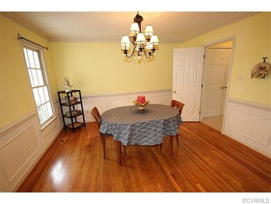 Formal dining room, hardwood floors, wainscoting, 