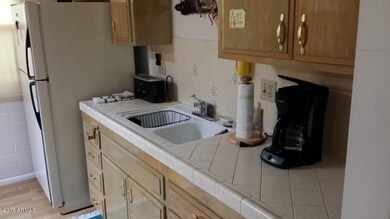 9938 W Crosby Cir N, Sun City, AZ 85351 - photo 7