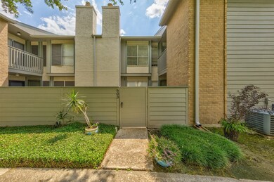 Gate leading to private patio area and unit.