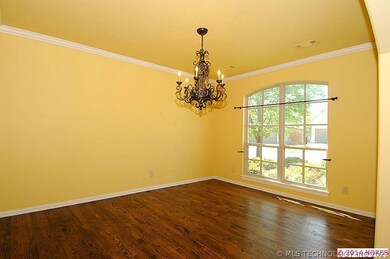 The formal dining room is generous in size and sit