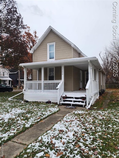 View of front of property with a porch
