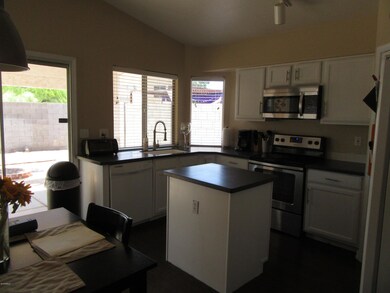 Kitchen facing rear yard