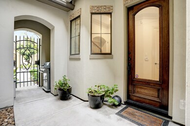 PRIVATE LOCKED GATED ENTRANCE TO THE FRONT DOOR.  PLACE FOR GAS GRILL