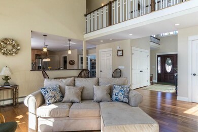 Bright foyer leads into the living room