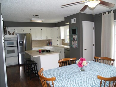 Spacious Kitchen Including Island & Utility Closet