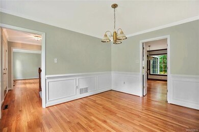 Formal dining room with fresh paint, newly refinis