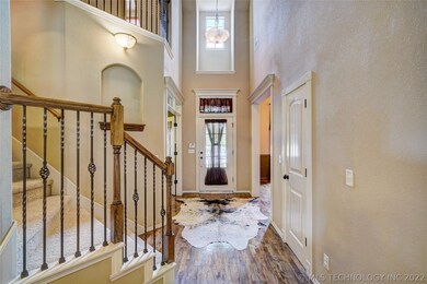 Welcome Home! Inviting foyer boasts hardwood floor