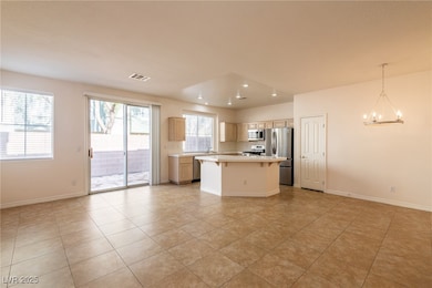 Kitchen featuring appliances with stainless steel
