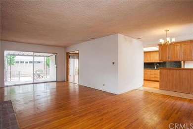 front living room. sliding doors to backyard. kitc