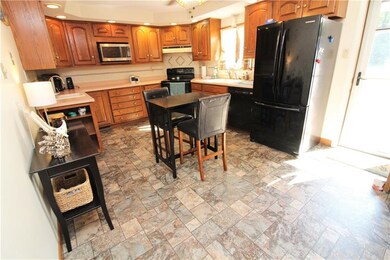 Kitchen - with walk out to rear deck