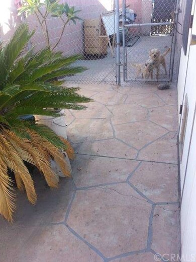 Attractive backyard patio slab, block wall on all 