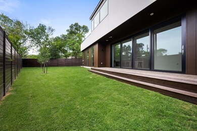 View of yard with a fenced backyard and a wooden 
