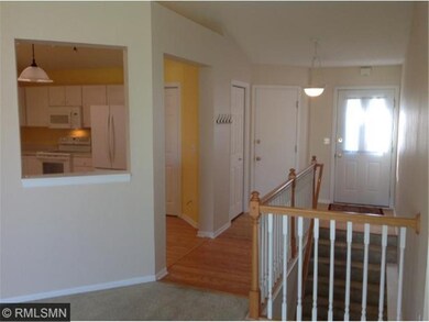 Real oak floors creates a welcome foyer and kitche