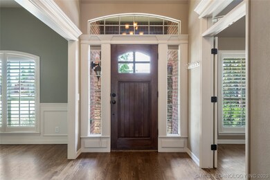 Beautiful entry with formal dining on left and off