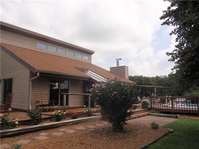 Great Place to Gather! Entertain your guests as they take a dip in the Pool, or just enjoy the Views!! Check out the 6x10 Attached Sunroom/Pool Room w/Skylight & Drain...Lots of Options!