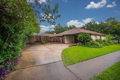 Side Entry Garage w/partial carport
