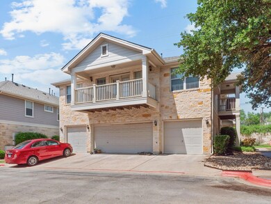Townhome / multi-family property featuring stone 