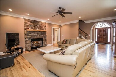 Living room with stone fireplace