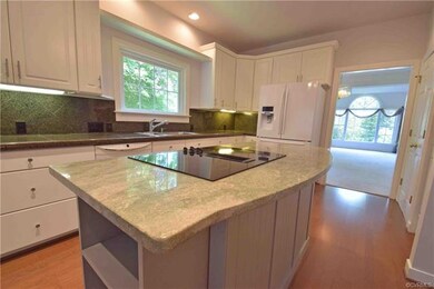 Accented island with beautiful granite.