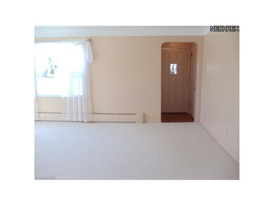 FRONT ENTRY BOASTS A LARGE FOYER WITH GUEST CLOSET