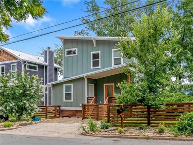 Front porch storage area for all your gear and outdoor activities.  Also a fenced in front and back yard for fido.