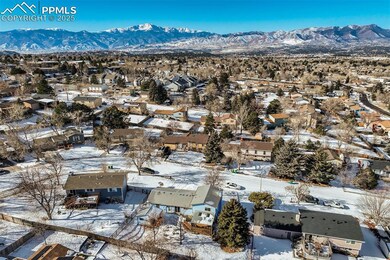 Snowy aerial view with a mountain view