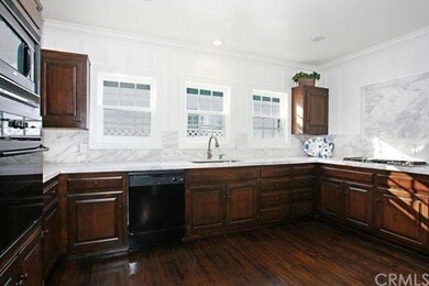 Kitchen with Carrera Marble Counters