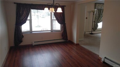 The formal dining room is large enough to entertai