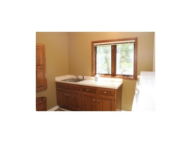 The large 1st Floor Laundry Room with built-in cab