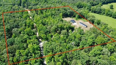 Bird's eye view featuring a wooded view